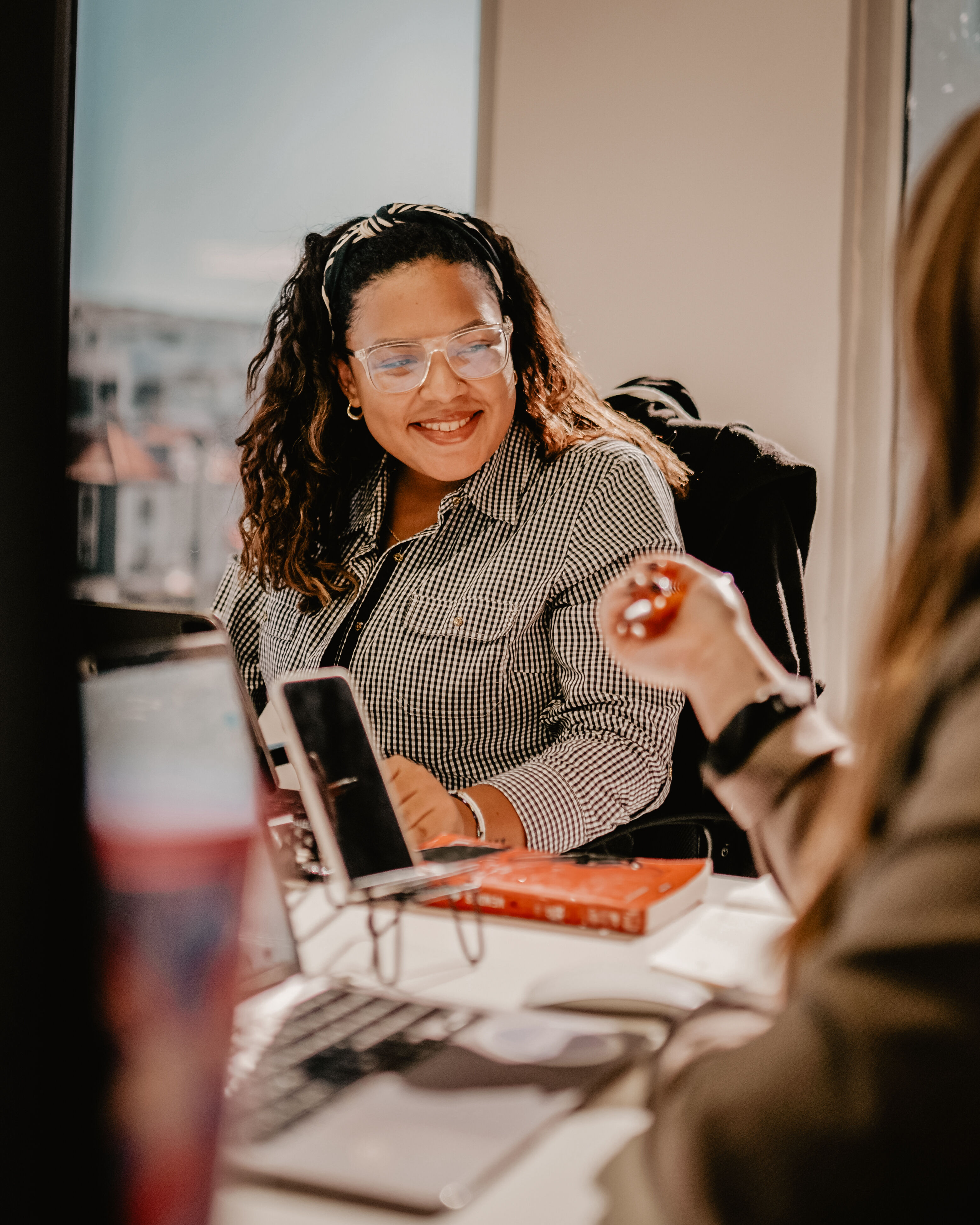 Insurance advisor speaking with a client in the office